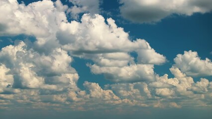 Blue sky with white clouds. Bright summer skyscape
