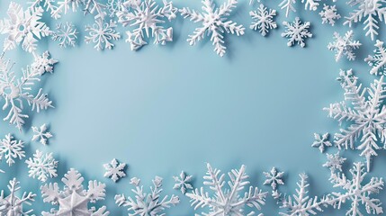 A festive border of snowflakes on a blue background