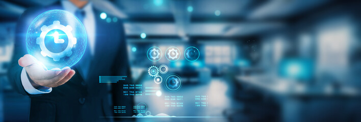 "Hand holding global network connection on screens, tablets, smartphones, laptops, and smartwatches, exemplifying time management through technology and futuristic connectivity. 