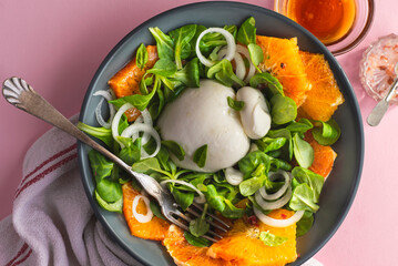 Burrata is a Pulian Italian cheese with a creamy base and a salad of red Sicilian oranges. Summer...