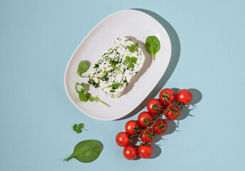 Primosale - simple Italian cheese with herbs and arugula, recipe for summer salads, low-calorie...