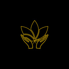 Hands Holding Lotus Flower gold icon isolated on black background 