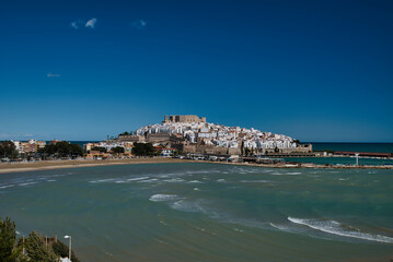 Next to the walls of the castle of Papa Luna and next to the port is the southern beach of...