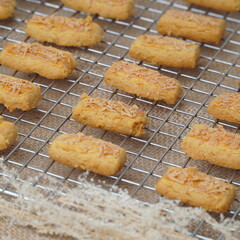 Fresh from the oven crunchy kaastengels cookies Indonesian cookies typically served during Hari Raya Idul Fitri
