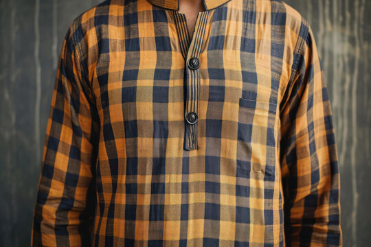 Young indian man in traditional chex kurta