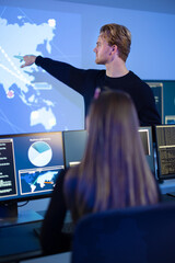 Cyber security team working in a Cyber Security Operations Center SOC to protect datacenter from security breach