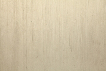 Yellowed silver-color metal wall, texture, background. Dirty, silvery surface with streaks of dirt....
