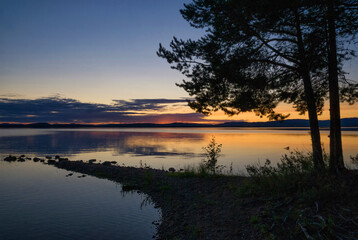 Obraz premium Beautiful Sunset over lake Orsa