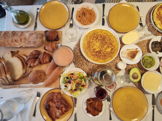 table full of food as sunday brunch breakfast