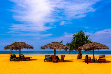 Tropical nature sand water waves fun Bentota Beach Sri Lanka.