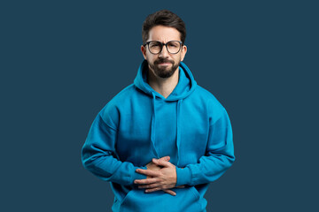 Photo portrait of man grimacing touching stomach injury poisoning disbalance diarrhea isolated on...