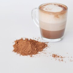 Handmade chocolate with glass of hot chocolate