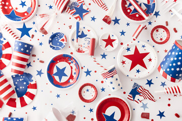Obraz premium Festive Independence Day Setup: Stylish Fourth of July Tabletop with Patriotic Plates and Centerpieces