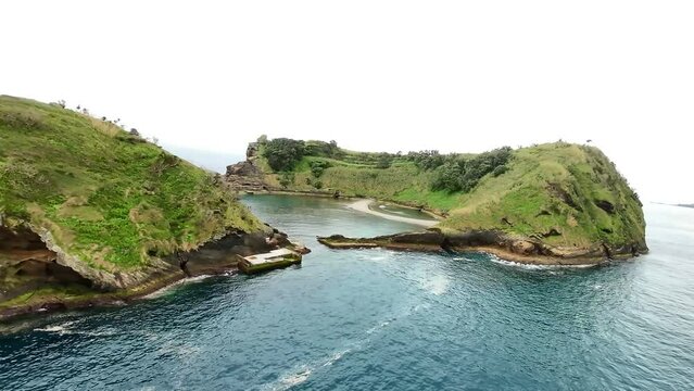 Drone shot of a scenic island Vila Franca do Campo at the coast of Sao Miguel island, Azores. 