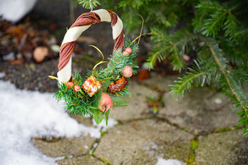New Year's tree branches. miniature wreath on a fir branch, New Year's decoration