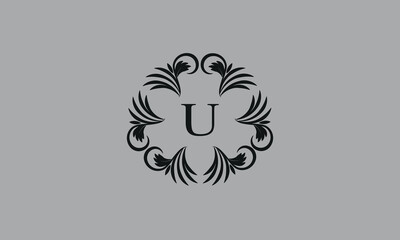 Elegant floral monogram design template for one or two letters such as U. Business sign, identity monogram for restaurant, boutique, hotel, heraldic, jewelry