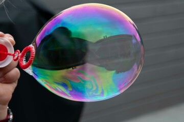 soap bubbles in hand