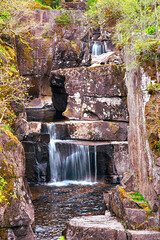 Fototapeta premium Landscape photograph of Bracklinn waterfall; callander, scotland, serenity; scenery; panorama; water, reservoir, pond, river, stream; boulder; rock, stone; rocky, mountain