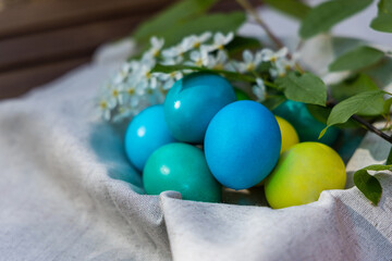 Harvest of Spring: A Cluster of Easter Eggs in a Rustic Basket
