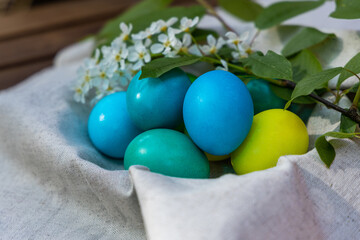Enigmatic Basket: A Bountiful Harvest of Blue and Green Eggs