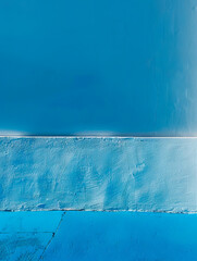 A blue wall with white paint.