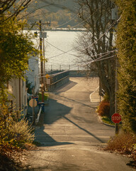 A street with view of the Hudson River in Rhinecliff, near Rhinebeck, New York