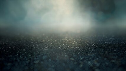 Closeup of wet asphalt road surface with blurred background and soft focus
