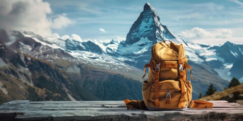 The image shows a backpack on a wooden table with snow-capped mountains in the distance