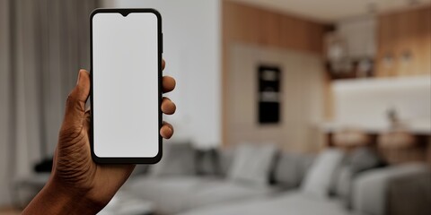 African-American Hand with smartphone in modern home, perfect for smart home app