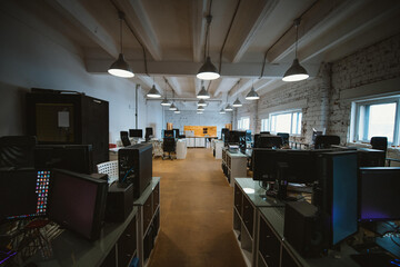 Modern spacious stylish office in loft style. Workspace without people.