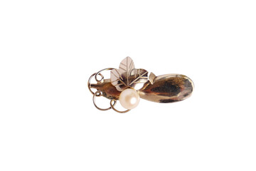 Precious brooch with pearls on a white isolated background.
