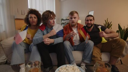 French and German Sport Championship fans cheering for favorite team, watching match on TV at home. European Germany and World football, Paris Games, 2024, USA, Canada, Mexico. Sports and soccer fans