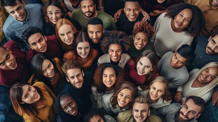 From directly above multi ethnic large group of people looking at camera. Concept of teamwork, democracy, pride, fair.