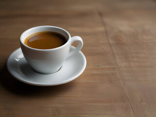 cup of coffee on wood table