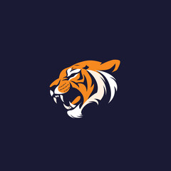 Fierce orange tiger head roaring powerful mascot dark navy background. Ferocious wild tiger sports team logo strength dominance. Angry face growling, mascot design navy orange contrast