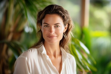 A Serene Gaze from a Knowledgeable Naturopath Against the Calming Backdrop of a Professional Naturopathy Center