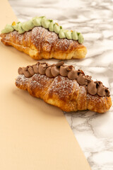 delicious croissant filled with chocolate or pistachio