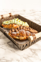 delicious croissant filled with chocolate or pistachio