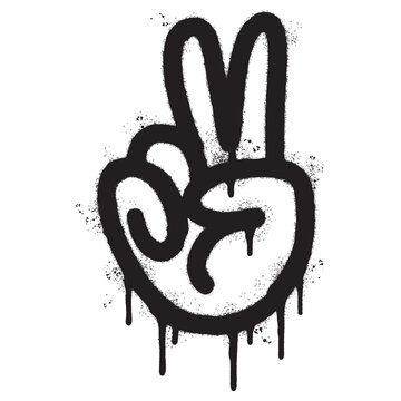 Spray Painted Graffiti Hand gesture V sign for victory icon Sprayed isolated with a white background. graffiti Hand gesture V sign for peace symbol with over spray in black over white.