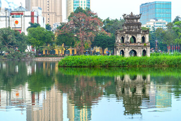Hoan Kiem Lake with the Turtle Tower in Hanoi Vietnam