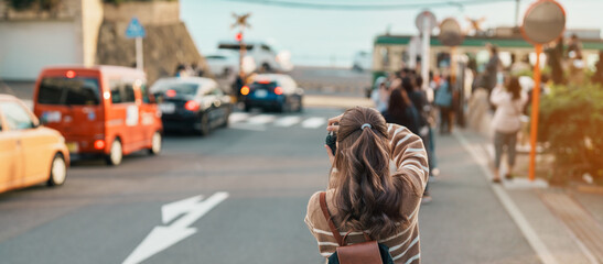 Woman tourist Visiting in Kamakura, Kanagawa, Japan. happy Traveler sightseeing Kamakurakokomae...