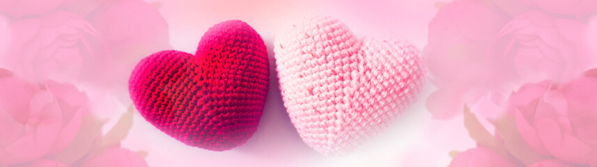 Pink and red crochet hearts and soft pink background. Love , romance, wedding, boho style