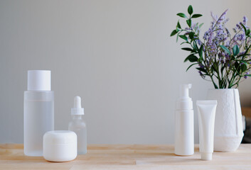 The set of skincare cosmetic product with flower. beauty banner and background