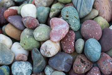 Image of a set of stones from the sea and the river of different colors. Stones wallpaper. Relax