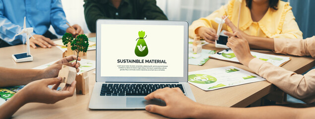 Sustainable material illustration displayed on laptop during green business meeting. ESG...
