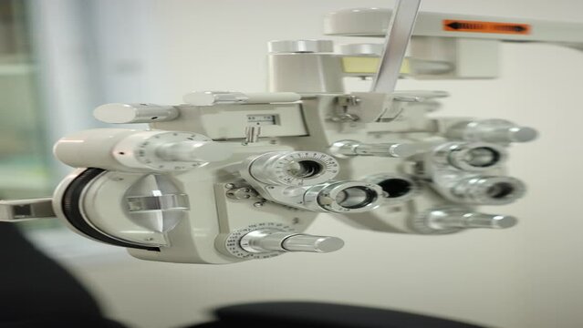 Closeup of a Phoropter refractor for eye test in optical store 