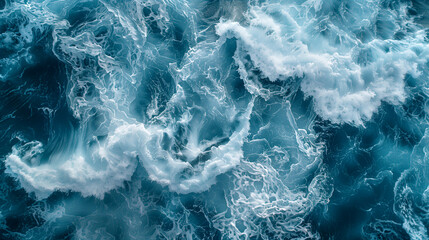 Obraz premium Aerial view of a vast body of water with waves crashing on the shore