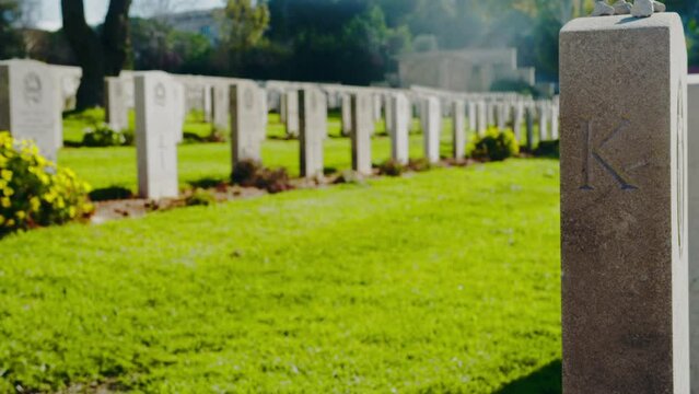 Gravestones in a row in a cemetery