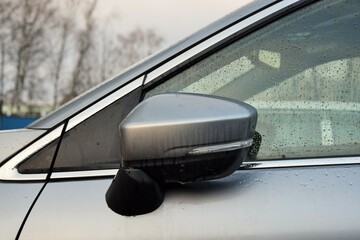 View of the side mirror of a modern car