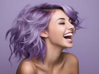 A woman with purple hair is smiling and laughing